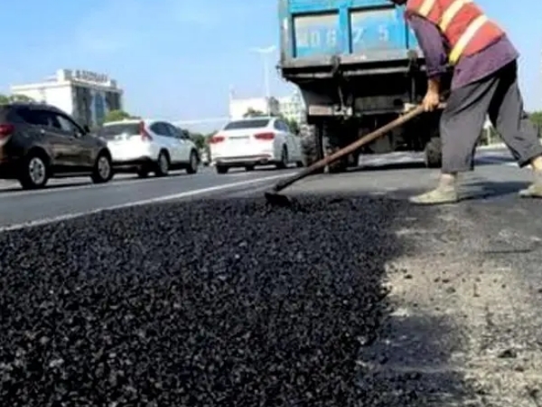 Asphalt cold patch road construction